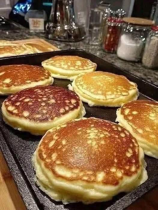 Soft Fluffy Golden Pancakes with Syrup